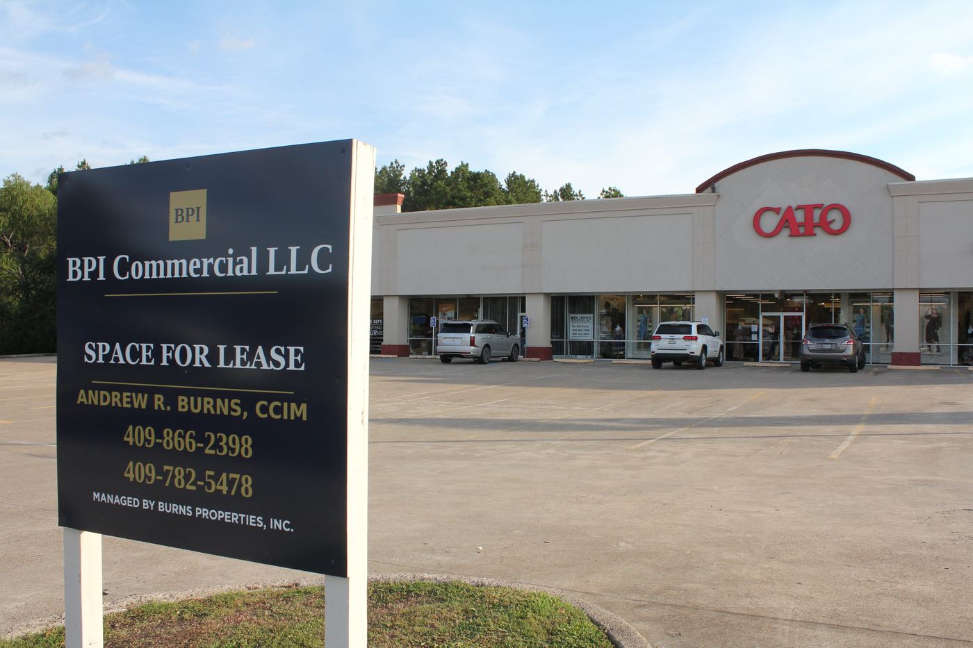 BPI Commercial LLC sign in front of a retail center